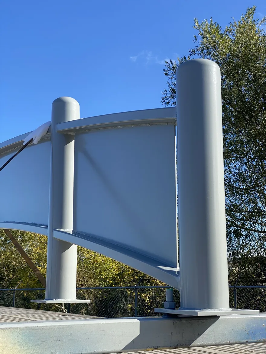 Grey powder-coated structural steel assembly